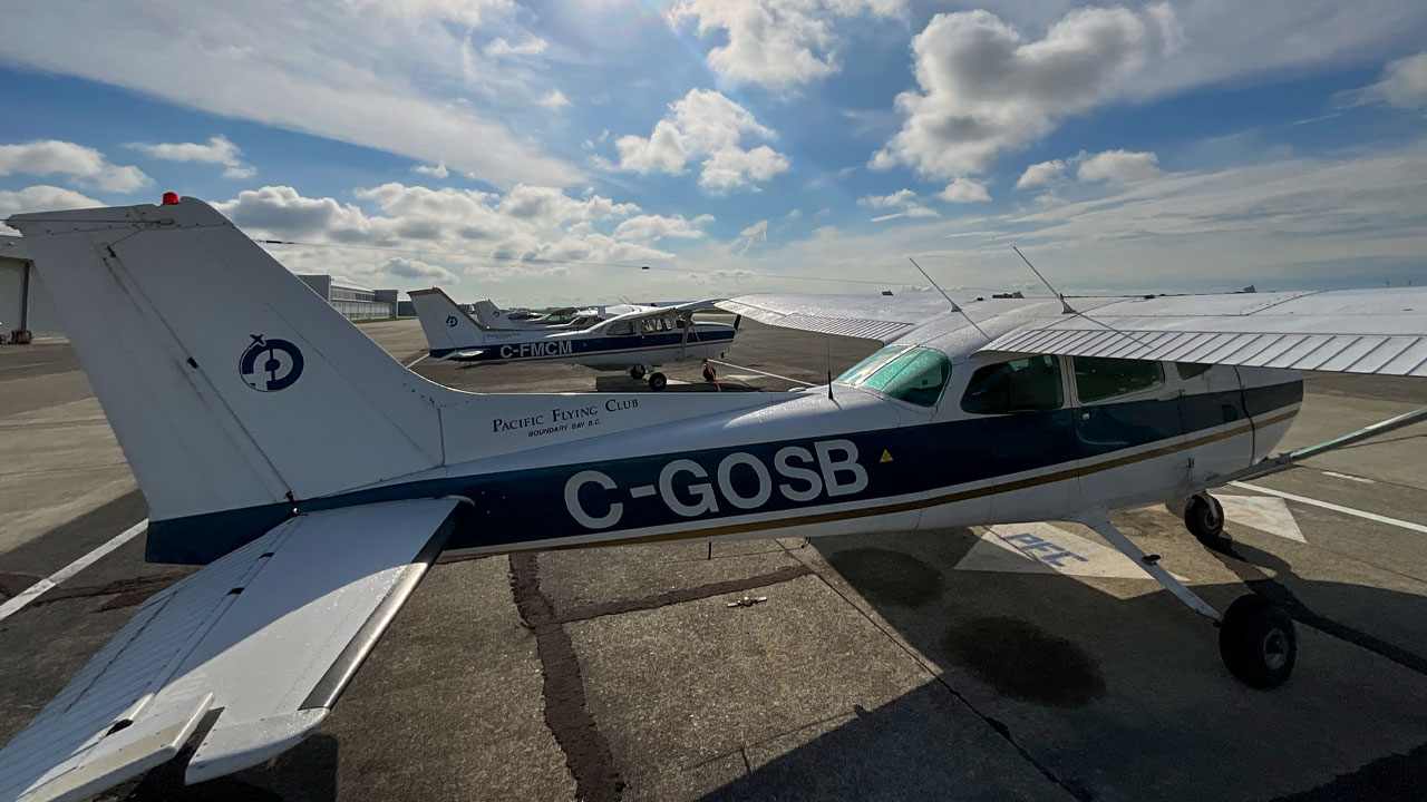 Fleet of Cessnas on a runway